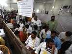 Polling agents are seen at a center during the counting of the Uttar Pradesh state assembly election votes in Noida on March 10, 2022. (Photo by Money SHARMA / AFP)