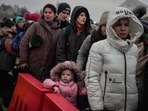 Representational image showing Ukrainian refugees waiting for their transportation after crossing the border. Representational image showing Ukrainian refugees waiting for their transportation after crossing the border.