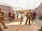 CISF personnel guard at the Ramabai Maidan counting centre, a day before counting of votes for Assembly polls, in Lucknow.(PTI) CISF personnel guard at the Ramabai Maidan counting centre, a day before counting of votes for Assembly polls, in Lucknow.(PTI)