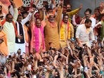 Yogi Adityanath gestures to his supporters after the Bharatiya Janata Party's &nbsp;win in the state assembly elections at the party office in Lucknow(AFP)
