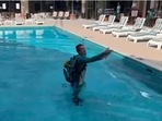 Carey could be seen throwing his phone after falling in the pool. (Pat Cummins Instagram) Carey could be seen throwing his phone after falling in the pool. (Pat Cummins Instagram)