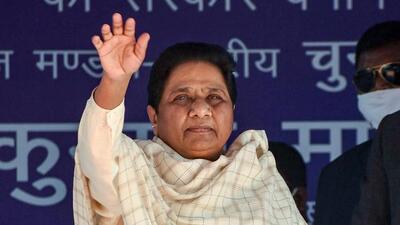 Bahujan Samaj Party president Mayawati waves during a public meeting for the ongoing UP polls, in Prayagraj, Monday. (PTI) Bahujan Samaj Party president Mayawati waves during a public meeting for the ongoing UP polls, in Prayagraj, Monday. (PTI)