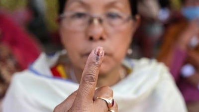 An elderly woman after casting her vote in the first phase of Manipur elections on February 28. (AP Photo) An elderly woman after casting her vote in the first phase of Manipur elections on February 28. (AP Photo)