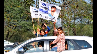 AAP supporters taking out a roadshow after the party recorded a thumping victory in the Punjab assembly elections on Thursday. (Ravi Kumat/HT) AAP supporters taking out a roadshow after the party recorded a thumping victory in the Punjab assembly elections on Thursday. (Ravi Kumat/HT)