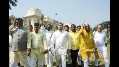 RJD leader Tejashwi Yadav along with party legislators outside the Bihar assembly on Thursday. (Santosh Kumar/HT Photo) RJD leader Tejashwi Yadav along with party legislators outside the Bihar assembly on Thursday. (Santosh Kumar/HT Photo)
