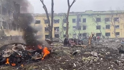 A view shows cars and a building of a hospital destroyed by an aviation strike amid Russia's invasion of Ukraine. (REUTERS)
