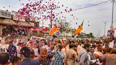 Bharatiya Janata Party supporters celebrate the party’s victory with flowers at Gallamandi Naubasta in Kanpur on Thursday. (PTI) Bharatiya Janata Party supporters celebrate the party’s victory with flowers at Gallamandi Naubasta in Kanpur on Thursday. (PTI)