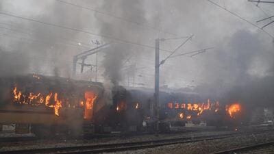 Alleging irregularities in the results of first stage NTPC exams, aspirants set fire to bogies of an empty train at the Gaya Railway Station in Bihar on January 26. (Santosh Kumar/Hindustan Times) Alleging irregularities in the results of first stage NTPC exams, aspirants set fire to bogies of an empty train at the Gaya Railway Station in Bihar on January 26. (Santosh Kumar/Hindustan Times)