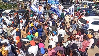 AAP supporters celebrating outsideat the Mohali office on Thursday. (Ravi Kumar/HT)