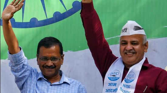 Delhi chief minister Arvind Kejriwal and deputy CM Manish Sisodia wave to AAP supporters after the party won the Punjab Assembly Elections 2022. (ANI)