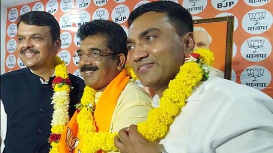 Goa chief minister Pramod Sawant (right) with Devendra Fadnavis and Bharatiya Janata Party state president Sadanand Shet after the party’s victory on Thursday. (ANI Photo)