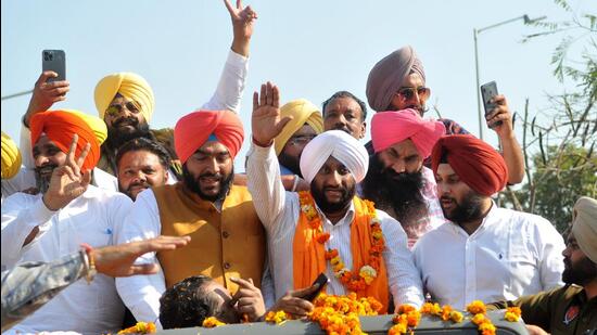 AAP’s Kulwant Singh during his victory procession in Mohali on Thursday. (Ravi Kumar/HT)