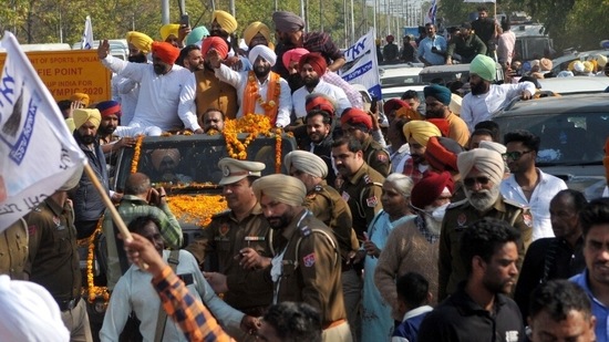 AAP Supporters during the roadshow after winning the election in Mohali on March 10, 2022. (Ravi Kumar/HT photo)