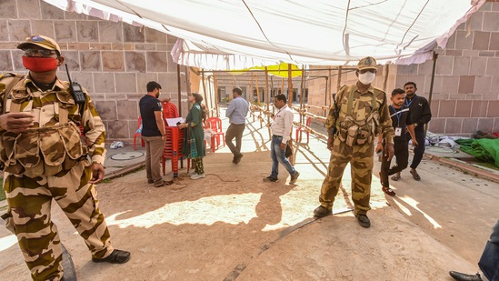 CISF personnel guard at the Ramabai Maidan counting centre, a day before counting of votes for Assembly polls, in Lucknow.(PTI)
