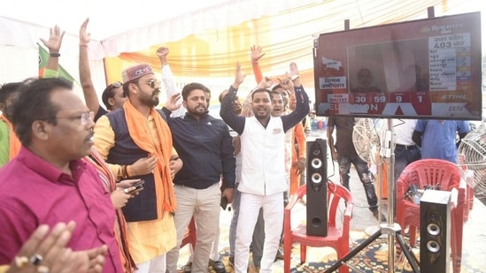 BJP supporters watching live telecast near counting center.