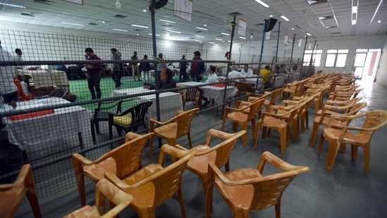 Preparations are underway for the counting of votes on March 10, at the wholesale flower market in Noida’s Sector 88 on Tuesday. (Sunil Ghosh/HT)