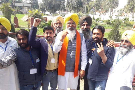 Former basketball player and AAP candidate Gurdit Singh Sekhon celebrating in Faridkot on Thursday. (HT Photo) Former basketball player and AAP candidate Gurdit Singh Sekhon celebrating in Faridkot on Thursday. (HT Photo)