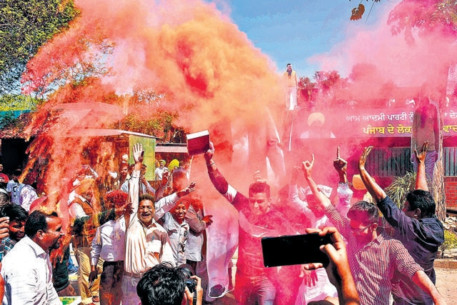 AAP supporters in a jubilant mood outside the party’s Punjab headquarters in Sector 39, Chandigarh, after the election results were announced on Thursday. (Keshav SIngh/HT) AAP supporters in a jubilant mood outside the party’s Punjab headquarters in Sector 39, Chandigarh, after the election results were announced on Thursday. (Keshav SIngh/HT)