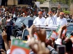 Prime Minister Narendra Modi waves at the supporters during a roadshow after BJP's victory in the recent Assembly polls, in Ahmedabad.(PTI) Prime Minister Narendra Modi waves at the supporters during a roadshow after BJP's victory in the recent Assembly polls, in Ahmedabad.(PTI)