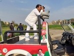 SP candidate from Hastinapur Yogesh Verma keeping a watch on the strong room through binoculars. (Hastinapur) SP candidate from Hastinapur Yogesh Verma keeping a watch on the strong room through binoculars. (Hastinapur)