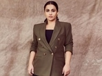 Actor Vidya Balan has kickstarted the promotions of her upcoming film Jalsa in full sartorial power, and the pictures speak for themselves. The star, who loves wearing sarees, switched up her style by opting for elegant and fiery looks. Vidya's latest look in a trendy blazer and a black midi dress backs our claim.(Instagram/@who_wore_what_when)