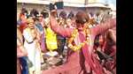 Devotees dancing to celebrate Laddoo Holi at Radha Rani Temple in Barsana. (HT) Devotees dancing to celebrate Laddoo Holi at Radha Rani Temple in Barsana. (HT)