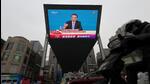 A rider drives past a giant screen showing a news conference by Chinese Premier Li Keqiang, following the closing session of the National People's Congress (NPC) at the Great Hall of the People in Beijing, China. (REUTERS) A rider drives past a giant screen showing a news conference by Chinese Premier Li Keqiang, following the closing session of the National People's Congress (NPC) at the Great Hall of the People in Beijing, China. (REUTERS)