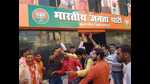 BJP workers celebrating at Braj region office of the party in Agra. (HT)