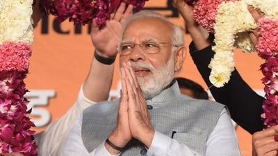 Prime Minister Narendra Modi being garlanded by BJP leaders following the party's win in the Uttar Pradesh assembly election in New Delhi on Thursday. (PTI) Prime Minister Narendra Modi being garlanded by BJP leaders following the party's win in the Uttar Pradesh assembly election in New Delhi on Thursday. (PTI)