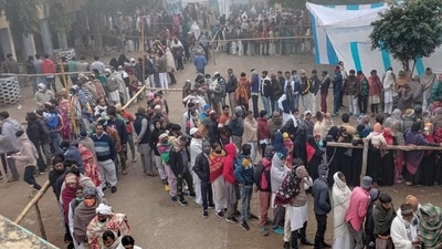 People stand in queues to cast their votes, during the first phase of UP Assembly polls, at a polling station, in Kairana.. (PTI Photo) People stand in queues to cast their votes, during the first phase of UP Assembly polls, at a polling station, in Kairana.. (PTI Photo)