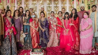 Tina Ambani shares photos from her son Anmol Ambani's wedding, in which the Bachchan family is also seen posing with the bride and groom. Tina Ambani shares photos from her son Anmol Ambani's wedding, in which the Bachchan family is also seen posing with the bride and groom.