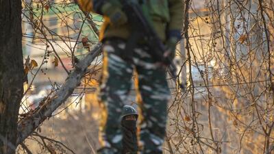 Security personnel in Jammu and Kashmir’s Kulgam district have cordoned off the area in Kulgam district where sarpanch Shabir Ahmad Mir was shot dead by terrorists on Friday evening (AP) Security personnel in Jammu and Kashmir’s Kulgam district have cordoned off the area in Kulgam district where sarpanch Shabir Ahmad Mir was shot dead by terrorists on Friday evening (AP)