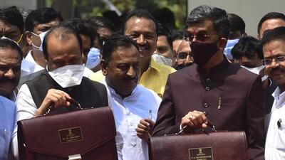 Dy CM Ajit Pawar and Shambhuraje Desai show their Budget 2022-23 bags during the State Budget Session at Vidhan Bhavan, in Mumbai, India, on Friday. (Anshuman Poyrekar/HT PHOTO) Dy CM Ajit Pawar and Shambhuraje Desai show their Budget 2022-23 bags during the State Budget Session at Vidhan Bhavan, in Mumbai, India, on Friday. (Anshuman Poyrekar/HT PHOTO)