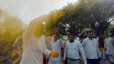 BJP workers celebrate the party’s victory in UP assembly election in Noida on Thursday. (Sunil Ghosh/HT Photo)