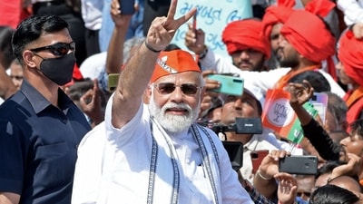 Prime Minister Narendra Modi held a roadshow here on Friday, just a day after the Bharatiya Janata Party (BJP) won in four out of five states including Uttar Pradesh, Uttarakhand, Manipur and Goa in recently concluded assembly polls. (AFP) Prime Minister Narendra Modi held a roadshow here on Friday, just a day after the Bharatiya Janata Party (BJP) won in four out of five states including Uttar Pradesh, Uttarakhand, Manipur and Goa in recently concluded assembly polls. (AFP)