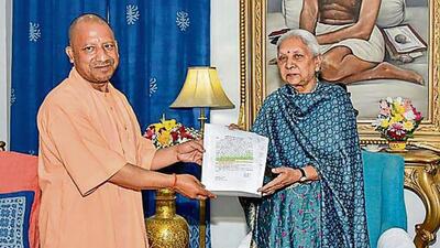 Uttar Pradesh chief minister Yogi Adityanath meets governor Anandiben Patel at Raj Bhavan in Lucknow on Friday. (PTI PHOTO) Uttar Pradesh chief minister Yogi Adityanath meets governor Anandiben Patel at Raj Bhavan in Lucknow on Friday. (PTI PHOTO)