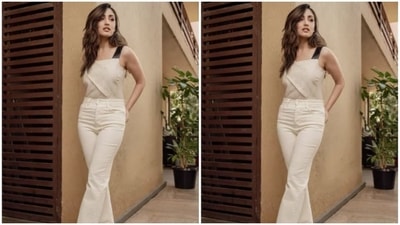 In another, Yami Gautam can be seen keeping it casual yet trendy in a white sleeveless top and high-rise tie-dye denim. (Instagram/@yamigautam)