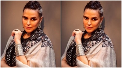 Neha accessorised her look with silver statement earrings, a silver bracelet and a ring, as she pulled off her boho chic look to perfection. (Instagram/@nehadhupia)