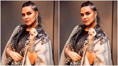 Styled by fashion stylist Ayesha Khanna, Neha wore her tresses into a French braid as she left few strands open around her face. (Instagram/@nehadhupia)