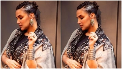 Assisted by makeup artist Venus Ferreira, Neha went minimal on her makeup to complement her look. In nude eyeshadow, mascara-laden eyelashes, drawn eyebrows, contoured cheeks and a shade of nude lipstick, Neha looked gorgeous as ever. (Instagram/@nehadhupia)