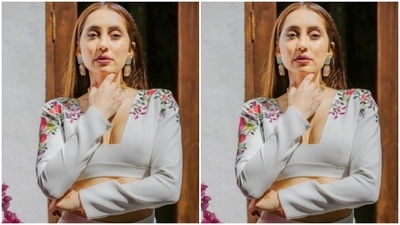 In a golden choker and grey and gold ear studs from the shelves of Manish Malhotra Jewellery, Anusha looked right out of a fairytale. (Instagram/@vjanusha)
