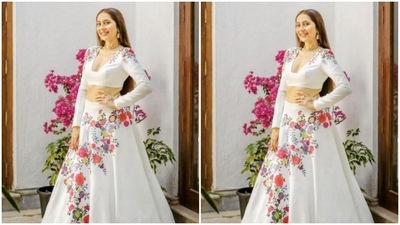 Styled by fashion stylist Khyati Busa, Anusha was all smiles for the camera beside a plant of bougainvillea which added more wedding vibes to her picture. (Instagram/@vjanusha)