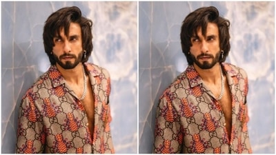 Ranveer decked up in a grey cotton shirt with printed details as he posed for the cameras. (Instagram/@ranveersingh)