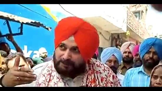 Punjab Congress president Navjot Singh Sidhu interacting with supporters in Amritsar East constituency on Friday, a day after he lost the election to AAP’s Jeevan Jyot Kaur. (ANI Photo)