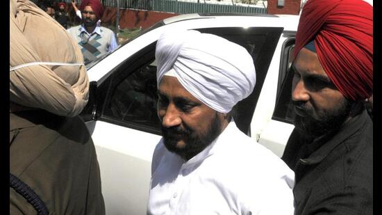 Chief minister Charanjit Singh Channi coming out from Punjab Raj Bhawan in Chandigarh on Friday after handing over his resignation to governor Banwarilal Purohit. Channi also recommended the dissolution of the 15th Punjab Vidhan Sabha to pave way for the formation of the new assembly. (Keshav Singh/HT)