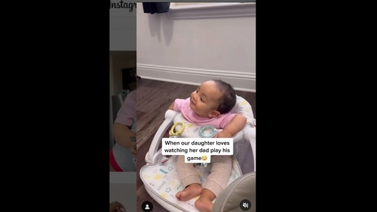 The toddler's reaction to her father playing a video game will melt your heart. (kyrahenry_/Instagram)