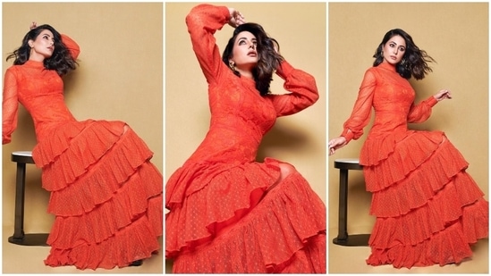 Hina Khan says hello to summer in an orange lace midi dress.&nbsp;
