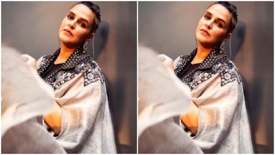 "Host mode on," wrote Neha as she posed while looking directly at the camera.(Instagram/@nehadhupia)
