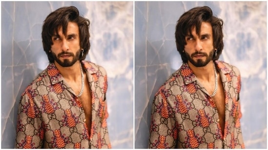Ranveer decked up in a grey cotton shirt with printed details as he posed for the cameras.(Instagram/@ranveersingh)