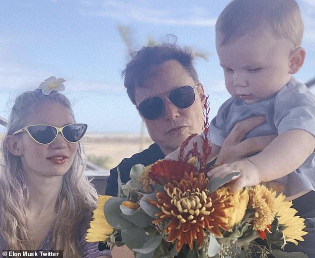 Grimes and Elon with their son. Grimes and Elon with their son.